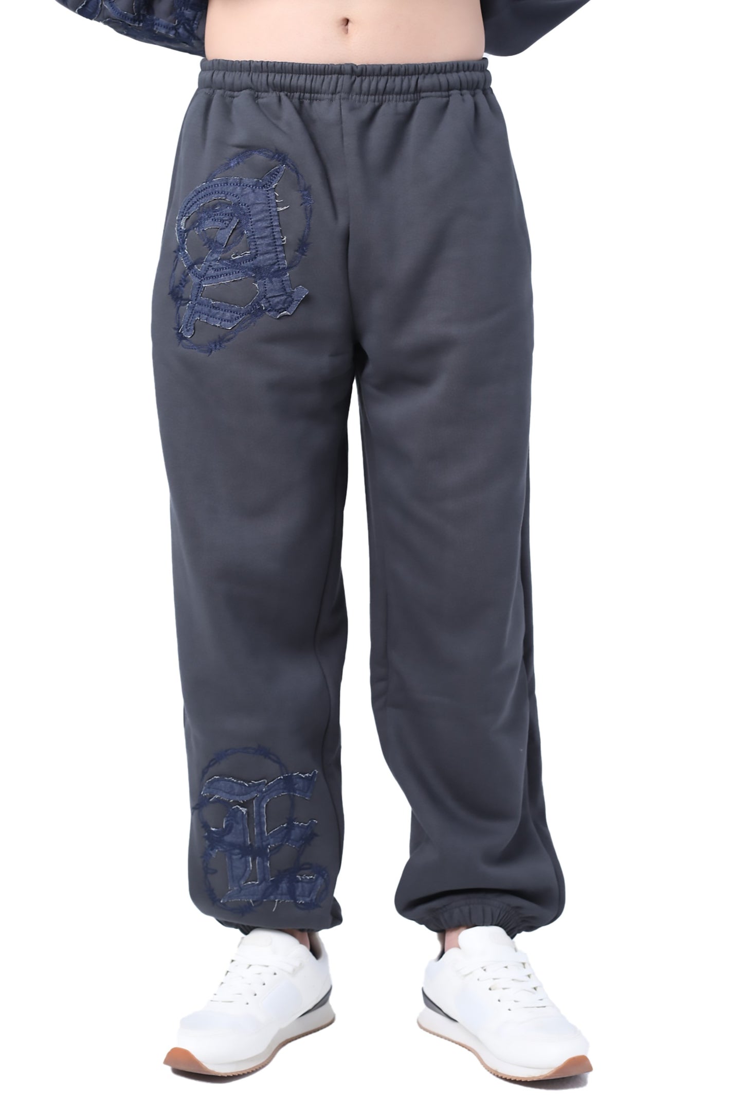 Applique sweatpants with embroidered patchwork